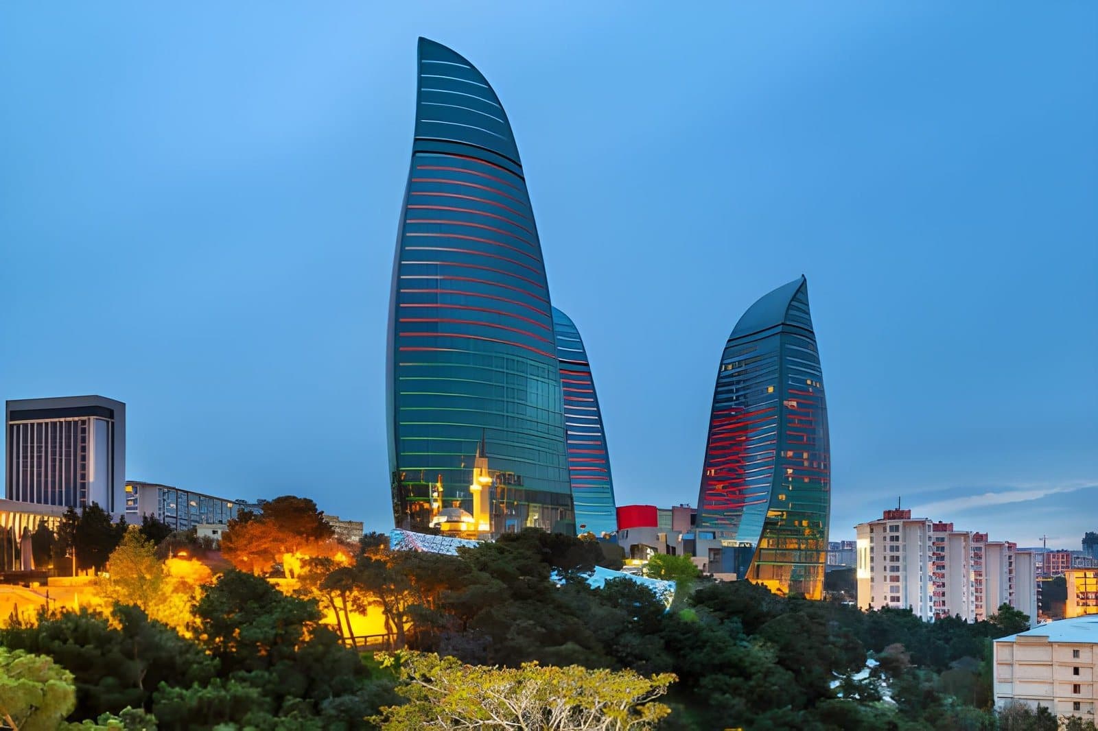 The Flame Towers lit at dusk